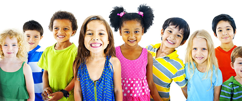 A group of children with diverse clothing colors posing together for a photograph.